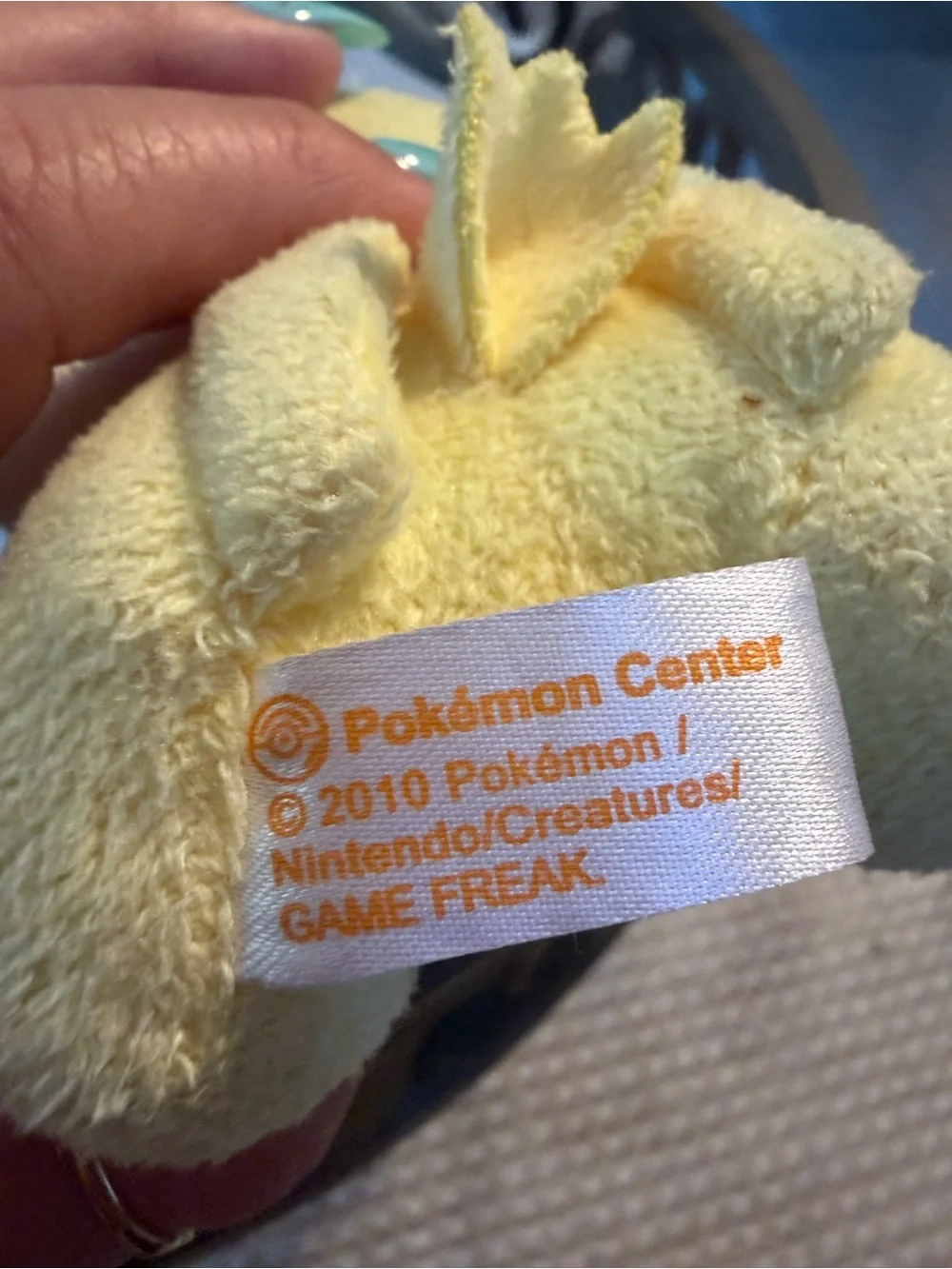Pokemon Yellow Alien-Style Plush Pet Toy with Black Eye Accents 2010